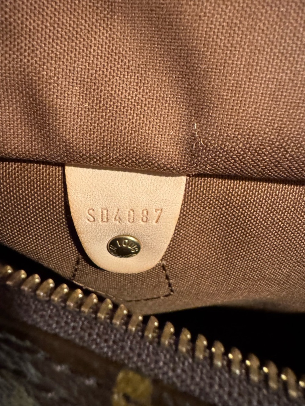 Louis Vuitton Brown and Tan Women's Tote - Monogram Interior Detail.  Keepall 30